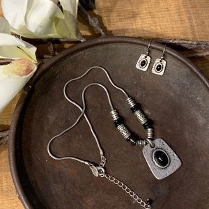 Necklace and earrings.